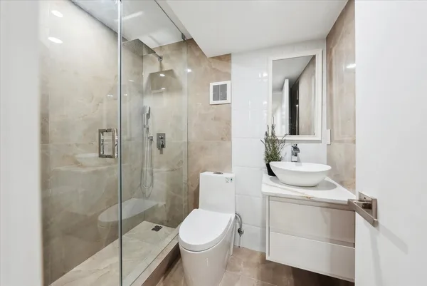 Family bathroom with custom vanity and mirror