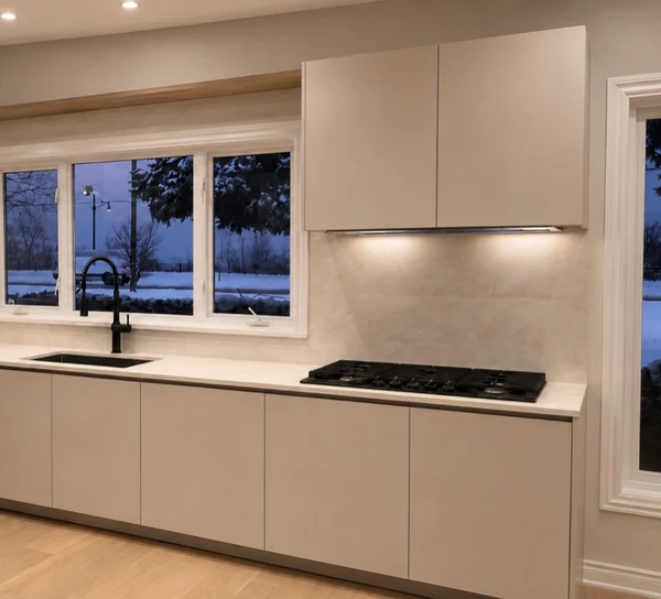 Hamilton kitchen with soft European cabinetry, range wall, and window view