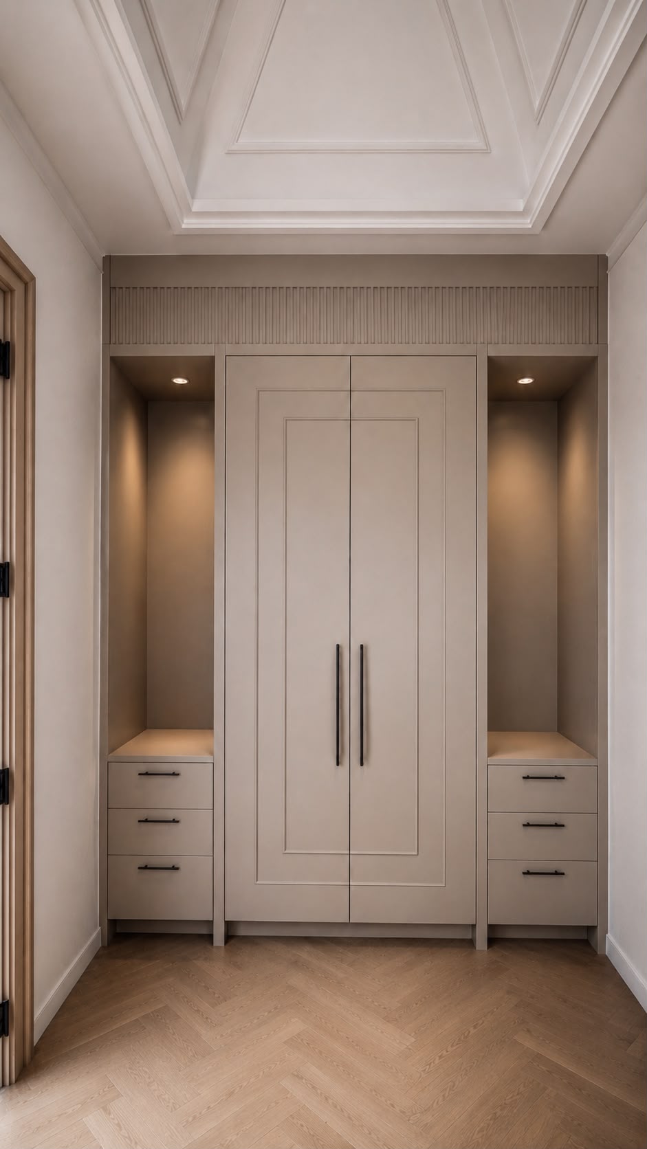Custom wardrobe niche with paneled doors, drawers, and integrated lighting
