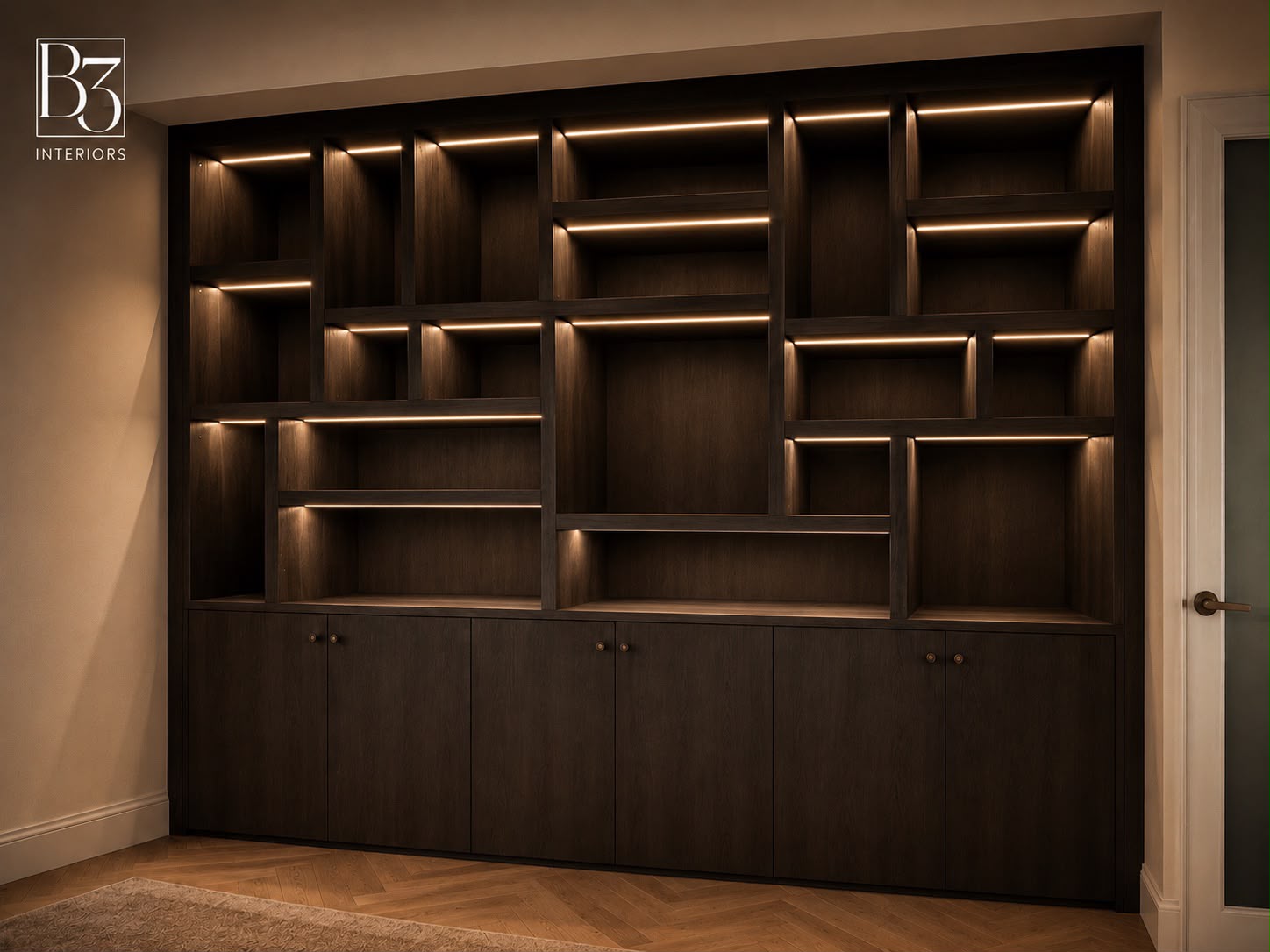 Dark wood built-in display wall with warm integrated lighting