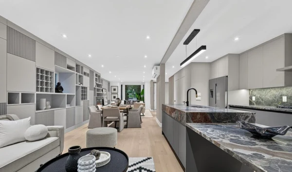Forest Hill open kitchen, dining, and living area with custom cabinetry