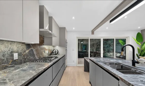 Forest Hill kitchen and living area with custom built-in storage