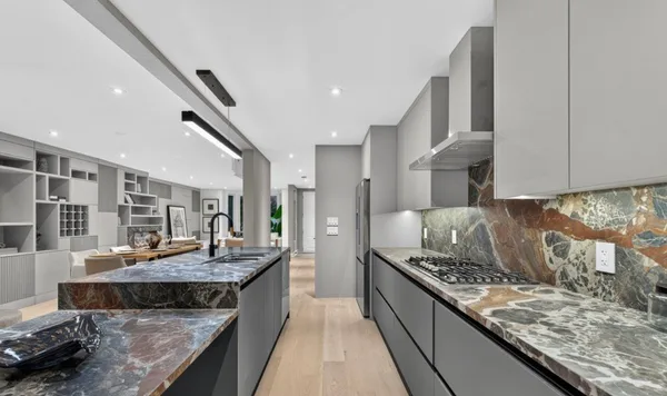 Forest Hill kitchen sink wall with grey slab cabinetry