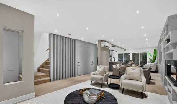 Forest Hill living area with custom cabinetry and open shelving