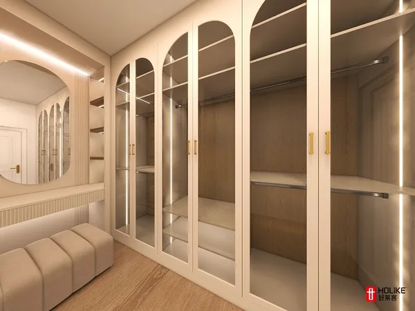Honeybourne walk-in closet with arched glass wardrobe doors