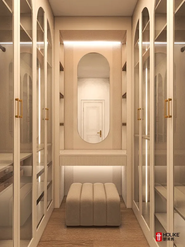 Honeybourne walk-in closet corridor with lit wardrobe doors